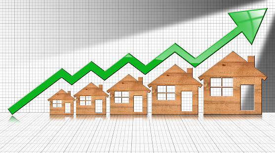 Growth graph with five wooden houses and green arrow moving up, 3d illustration. Positive real estate market graph.