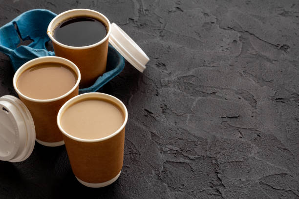istock Many paper cups with coffee. Coffee to go background 1661180739