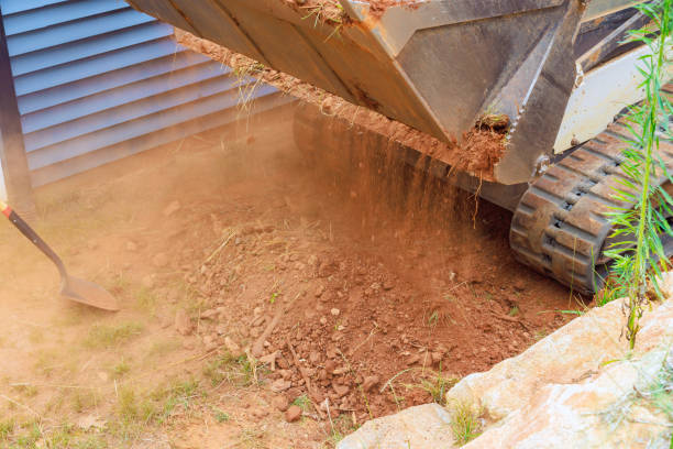 istock Mini bulldozer role in landscaping works encompasses earth moving tasks 1661194678