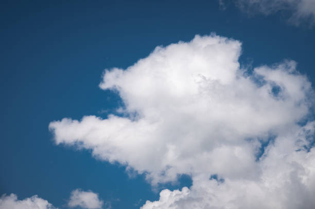 istock Soft white cloud and blue sky background. Large cumulus clouds. Close-up 1661214681