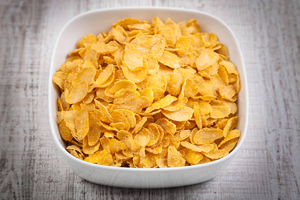 istock Bowl of corn flakes on a table 166124906