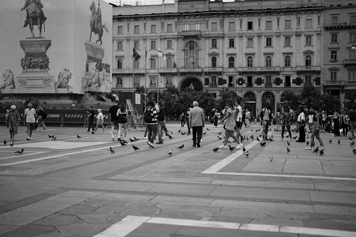 Milano, Italy - September 05, 2023: People across Piazza del Duomo in Milan