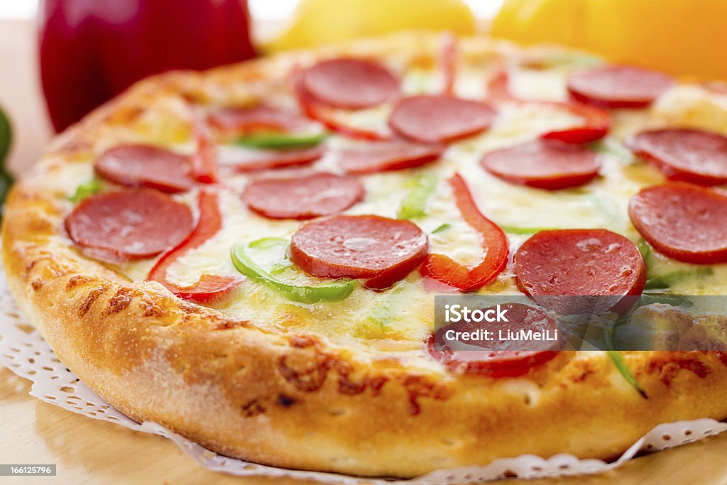 Sausage pizza Delicious sausage pizza, put on the chopping board Afternoon Tea Stock Photo