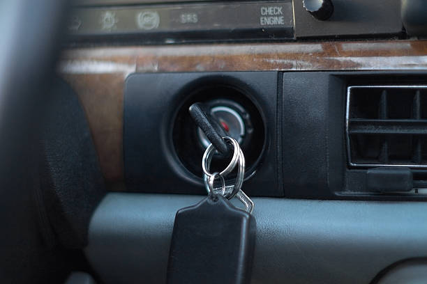 car key in ignition stock photo