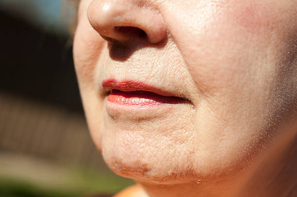 Close-up of old white woman nose and mouth stock photo