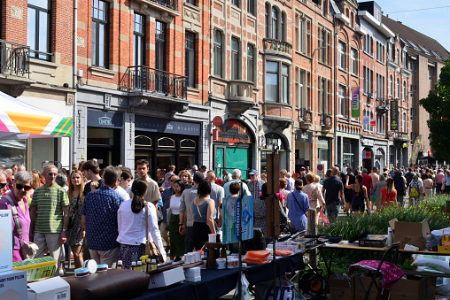 Leuven, Vlaams-Brabant, Belgium - September 4, 2023: once in a year food and non-food market. Street crowded with tourists and locals