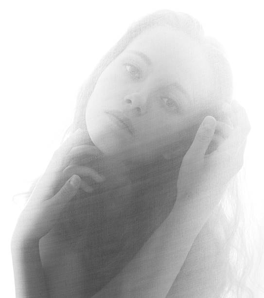 istock beautiful girl behind a curtain 166129105