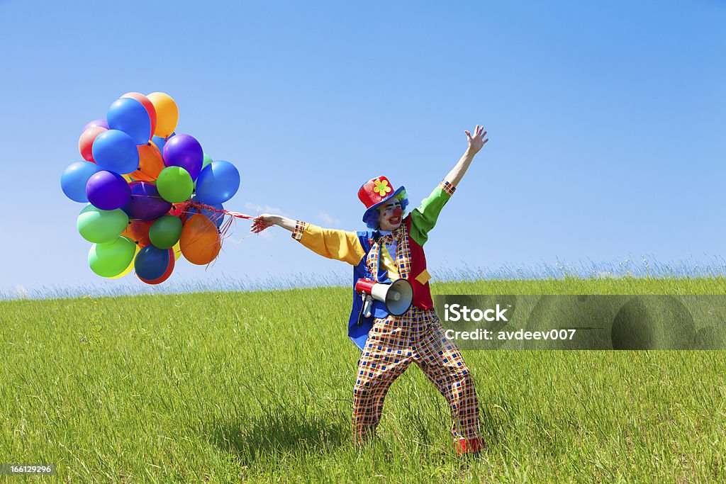 Clown tenant des ballons - Photo de Clown libre de droits