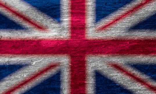 Flag and coat of arms of Great Britain on a textured background. Concept collage.