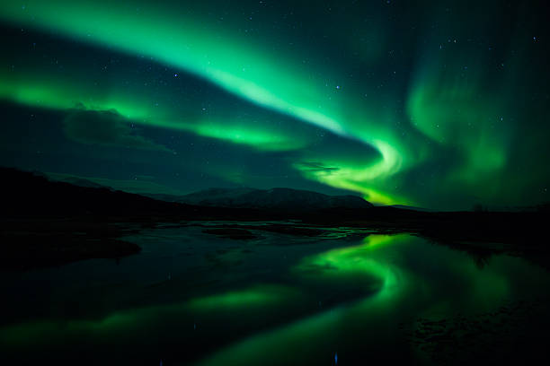istock Northern lights (Aurora borealis) Over Iceland 166130491