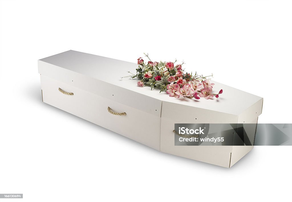 cardboard bio-degradable eco coffin isolated on white with clipping path cardboard; bio-degradable; eco; ecological; coffin; isolated; clipping path; box; case; casket; cemetery; closed; dead; death; eternity; funeral; grave; object ; white background; wood; wooden; green; ethical,economical Coffin Stock Photo