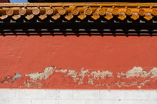 Broken Chinese style red wall