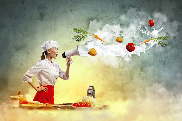 istock Asian female cook holding megaphone 166131101