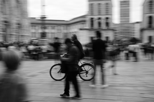 Milan, Italy - September 05, 2023: ride a bicycle in piazza del Duomo in Milan