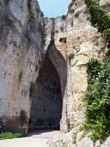 Artificial limestone cave carved out of the Temenites hill in the city of Syracuse