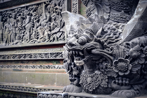 Sculpture of demon in  Pura Dalem Ubud temple in Bali, Indonesia
