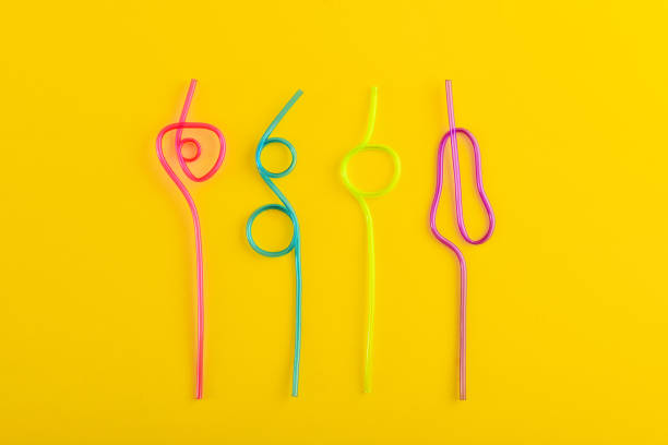 istock Multi-colored semi-transparent in many shapes straws. 1661347791