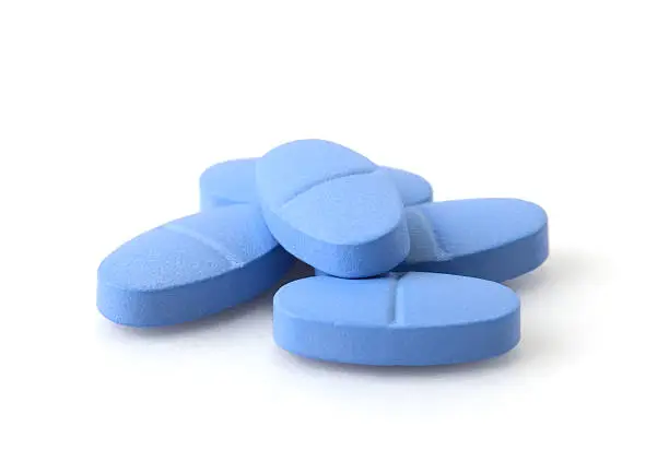 Blue medicines on white background