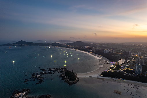 An aerial view of the seaside town at dusk