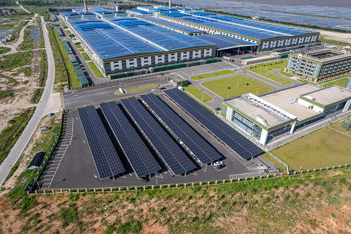 Aerial view of solar power generation in a seaside factory