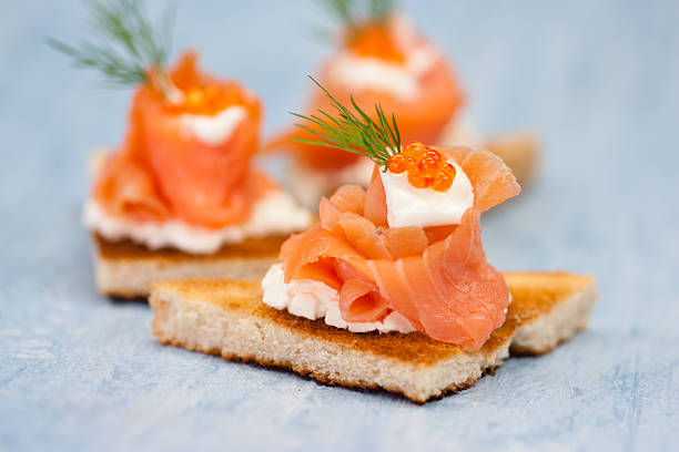 smoked salmon crostini stock photo