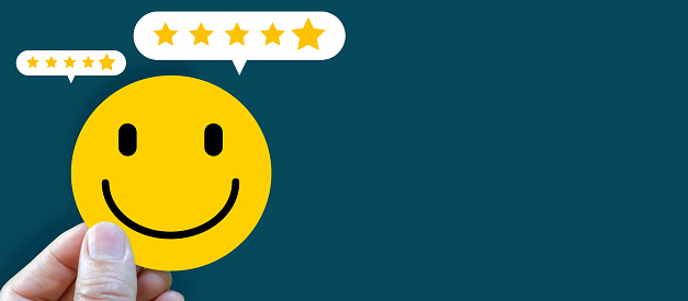 Customer service and satisfaction, five star, customer, hand of customer or client holding the stars to complete five stars, Quality assurance, give satisfaction in service. rating very impressed