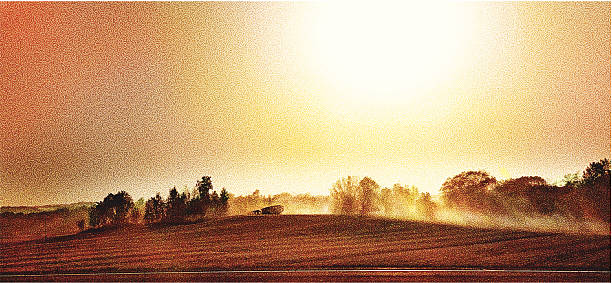 Harvesting Crops Stipple illustration of a combine harvesting crops. The dust from many combines working in the area creates a hazy sky. threshing stock illustrations