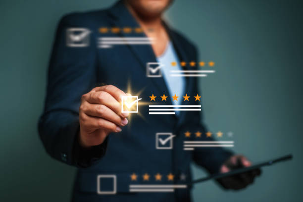 istock Customer rating and satisfaction concept, Man using laptop and touch virtual screen for give five star symbol to increase rating of product and service concept. 1661369422