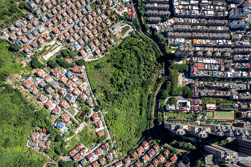 Aerial view of a forest covered villa group on the mountain