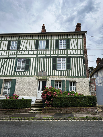 Arques-la-Bataille, Normandy, France - 24th August, 2023: Street view of beautiful facade of half-timbered house in Arques-la-Bataille