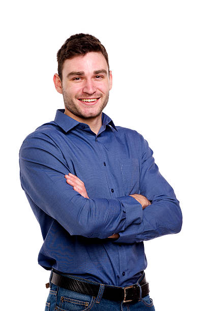istock Man wearing a blue shirt with his arms folded 166140780