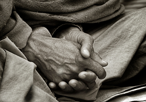 Man meditating with hands in his lap