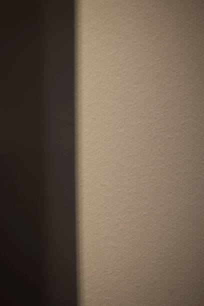 istock Light and shadow illuminate the black space room 1661430485