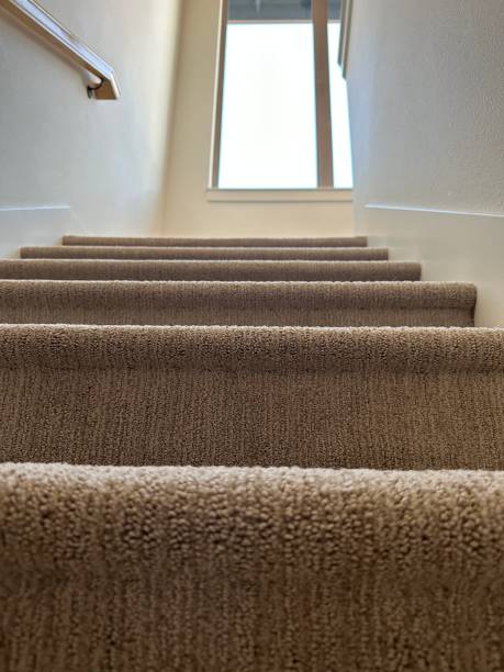 istock Carpet running upstairs 1661441172