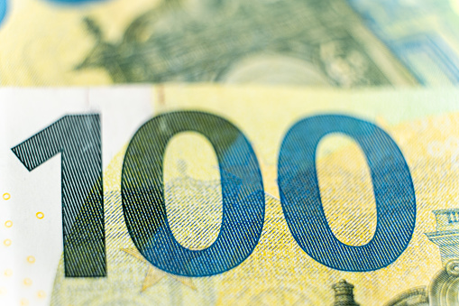 Banknote 100 euro macro close-up money.