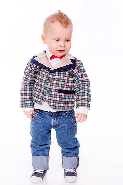 istock baby-boy wearing suit on white background 166144427