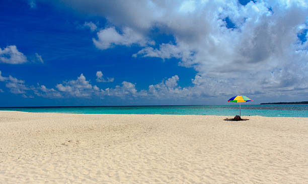 istock White beach, blue skies & clouds 166144527