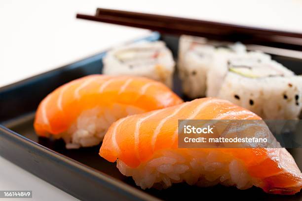 Sushi Plate Stock Photo - Download Image Now - Book, Chopsticks, Cooking