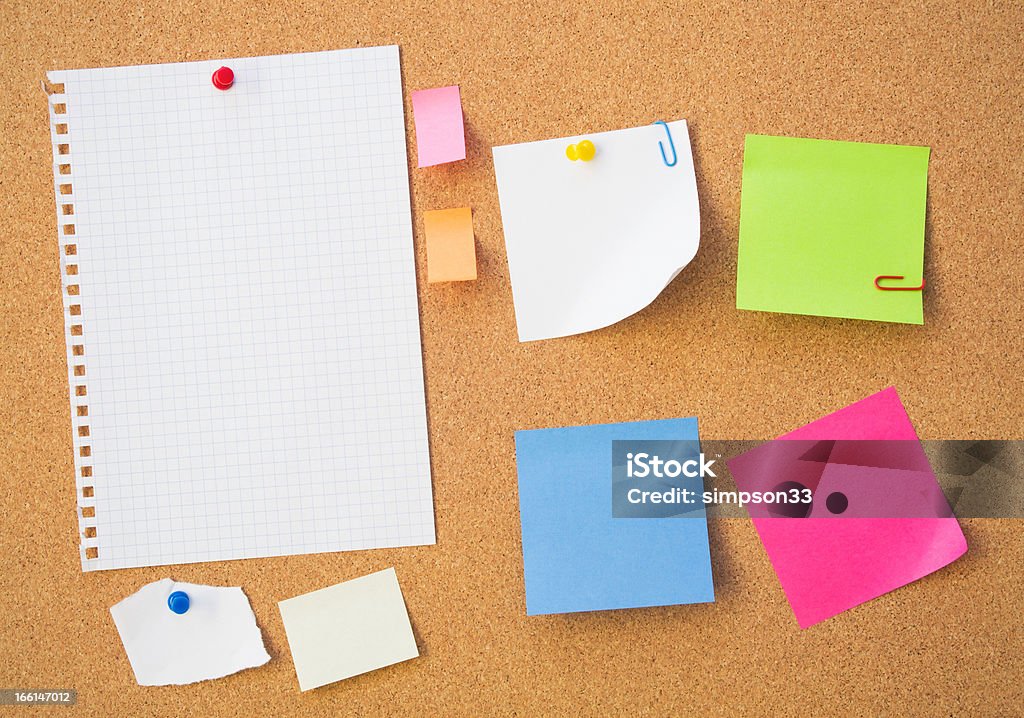 Colour note papers on pin board. Cork background Advice Stock Photo