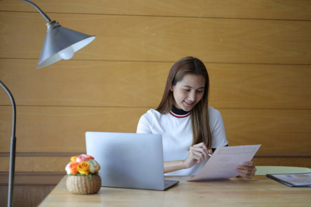 istock Woman studying online seminar on internet laptop. 1661476766
