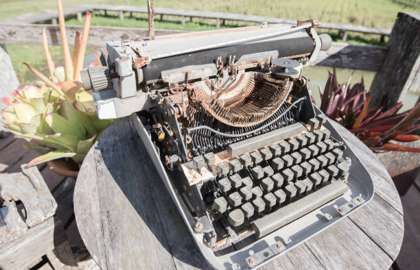 istock Abandoned vintage typewriter in the open air 1661477375