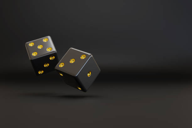 istock Two black dice with gold dots floating with copy space. 3d illustration. 1661477428