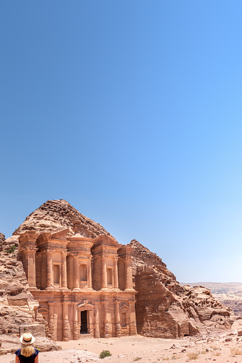 The Monastery, Petra, Jordan: The Monastery, also known as Ad Deir and also spelled ad-Dayr and el-Deir, is a monumental building carved out of sandstone in the ancient Jordanian city of Petra. The Monastery was probably carved in the mid-first century AD.