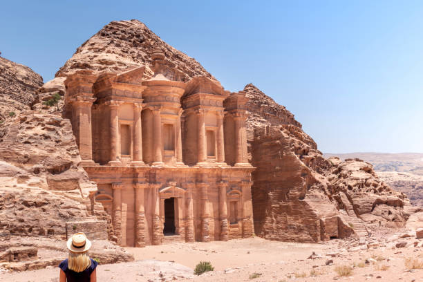 The Monastery, Petra, Jordan: The Monastery, also known as Ad Deir and also spelled ad-Dayr and el-Deir, is a monumental building carved out of sandstone in the ancient Jordanian city of Petra. The Monastery was probably carved in the mid-first century AD.