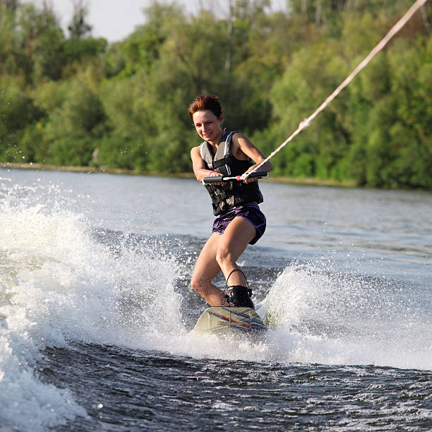 istock beauty girl on wakeboard 166150019