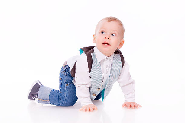 istock baby-boy wearing suit on white background 166151103