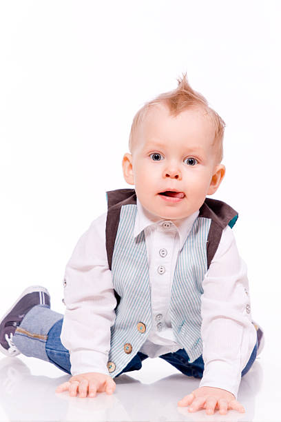istock baby-boy wearing suit on white background 166151109