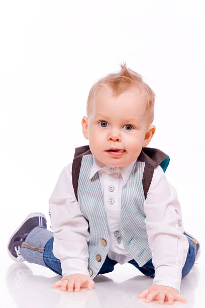istock baby-boy wearing suit on white background 166151114