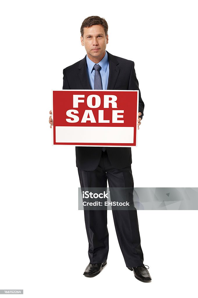 Homme d'affaires en tenant vendu signe isolé sur fond blanc - Photo de Adulte libre de droits
