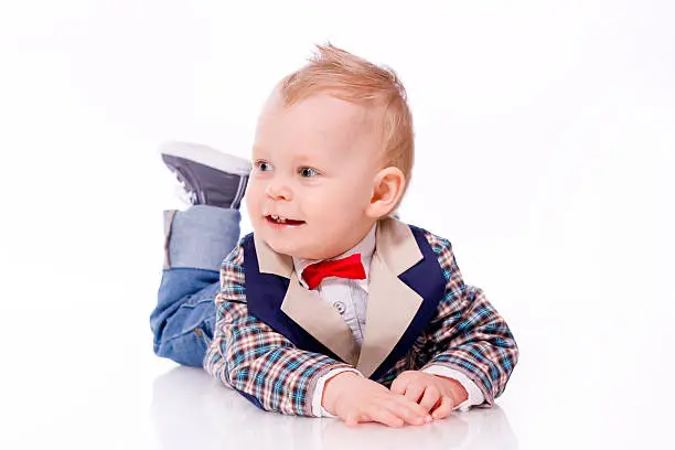 baby-boy wearing suit on white background
